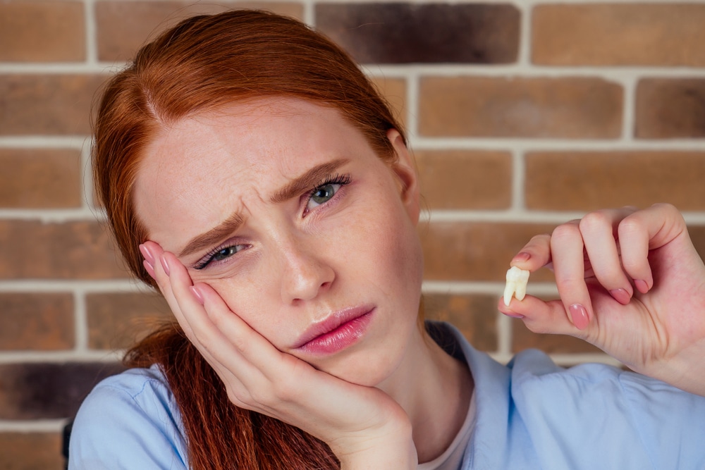 tooth with root canal hurts with pressure
